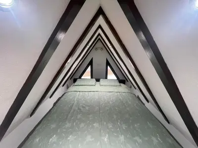 an overhead view of a bed in a room at Ćilibar Stara planina in Crni Vrh