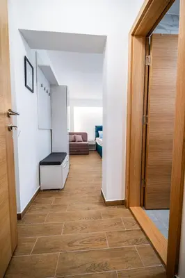 a hallway with a door and a room at Vila Vrnjačka Banja in Vrnjačka Banja