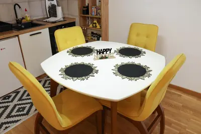 a kitchen table with yellow chairs and a white table at Apartman Wish Lux in Vrnjci
