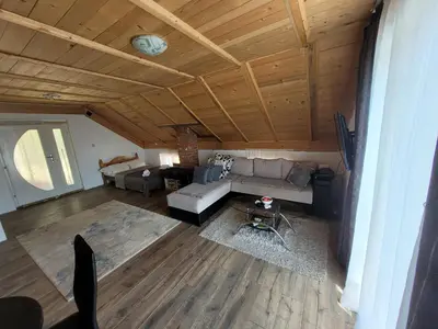 an overhead view of a living room with a couch at Kalina in Vlasina Okruglica