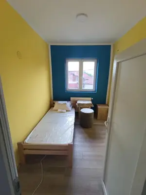 a small room with a bed and a window at Tara in Surdulica