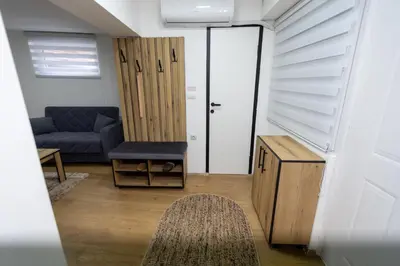 a living room with a couch and a table at Bakina kuca in Pirot