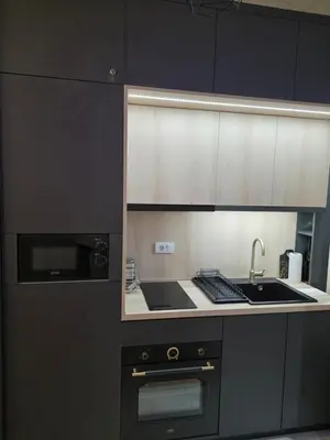 a kitchen with a sink and a microwave at POSEJDON DELUXe 4 in Vrnjačka Banja