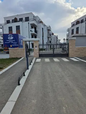 an empty street in front of some buildings at POSEJDON DELUXe 4 in Vrnjačka Banja