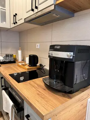 a kitchen with a coffee maker on a counter at Royal apartmani 42 in Vrnjci