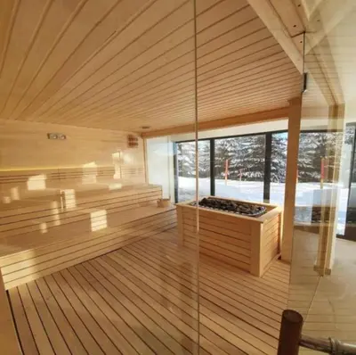 a large room with a sauna in a house at The Pine Loft by Kopaonik in Kopaonik