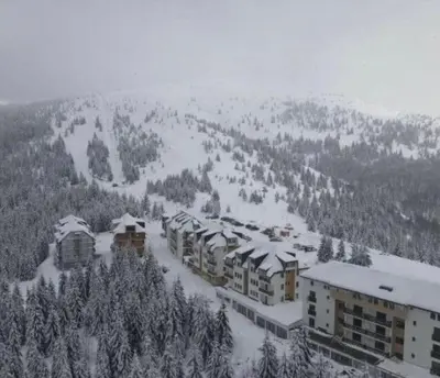 an aerial view of a resort in the snow at The Pine Loft by Kopaonik in Kopaonik