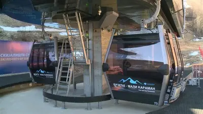 a bus with a ladder on the side of it at Zimski san in Brzeće