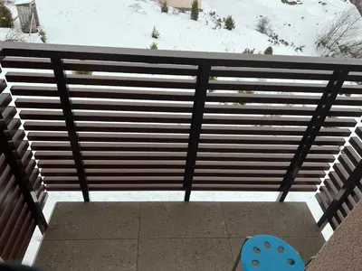 a view from the top of a fence with snow at Apartment in Belvedere Hills Luxury Apartments and Spa in Kopaonik