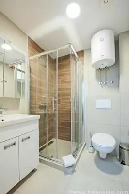 a bathroom with a shower and a toilet and a sink at Kraljevi Čardaci - Despot Apartman in Kopaonik