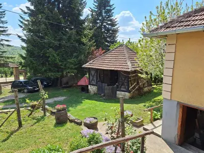 a garden with a gazebo in the yard at Domaćinstvo Drenak - Bešnjaja in Kragujevac