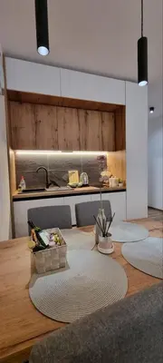 a table with a basket on top of it at SKYLINE apartments Kopaonik in Kopaonik