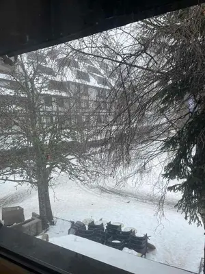a group of chairs sitting in the snow at Centar slope apartman in Kopaonik