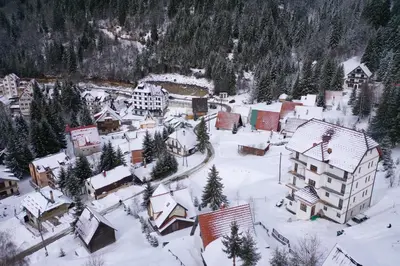 an aerial view of a town covered in snow at Apartment Petrović in Kopaonik