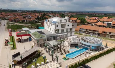 an aerial view of a town with a water park at Hotel Bella Nella in Leskovac