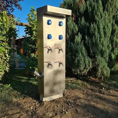 a box with four birds on it in a yard at Garni Hotel & Spa Nicolo in Kruševac