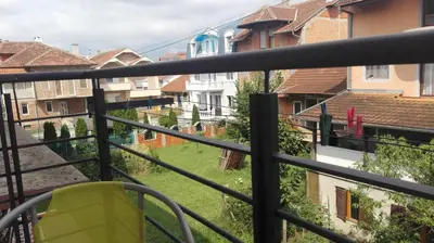 a balcony with a view of some buildings at Guest House Trajkovic Jagodina in Jagodina