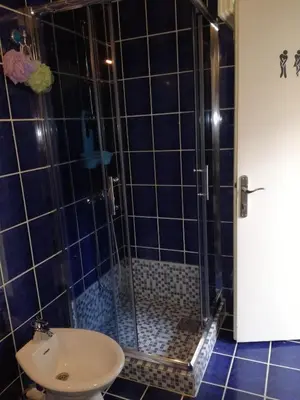 a bathroom with a shower and a sink at Apartman Centar in Kruševac