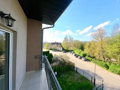 a balcony of a house with a view of a street at Filip Apartments in Soko Banja