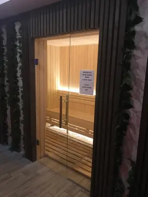 a glass door with a sign on it at Apartment Andrijana in Kopaonik