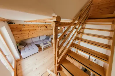 an overhead view of a room with wooden stairs at Holiday Home Elena in Kopaonik