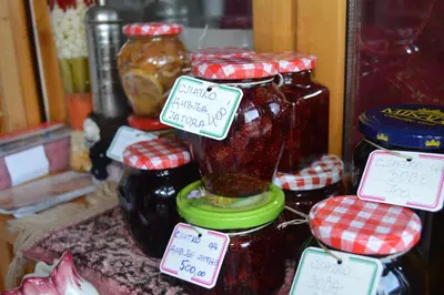 a display of jars of jam on a table at Guest House Vila Horizont in Goč