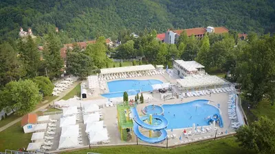 an aerial view of a resort with two swimming pools at Hotel Radan Prolom Banja in Prolomska Banja
