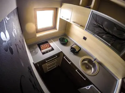 an overhead view of a small bathroom with a sink at SM Apartments Kopaonik in Kopaonik