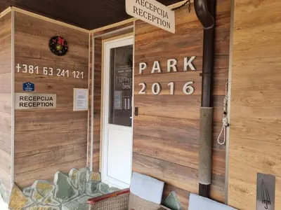a door to the entrance to a park building at Apartments Park 2016 in Surdulica