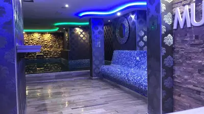 a room with a bed in the middle of it at Apartment Elvir in Kopaonik
