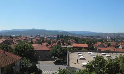 a view of a town with a parking lot at Studio Ema in Niš