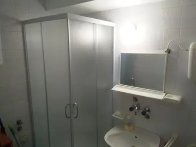 a bathroom with a shower and a sink at KOPAONIK-GONDOLA 100m in Brzeće