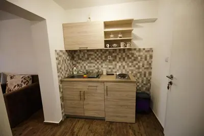 a small kitchen with a sink in a room at Apartment Azulmburgo in Vrnjačka Banja