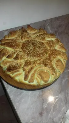 a pizza sitting on top of a table at Country house Dunjin Konak in Rogljevo