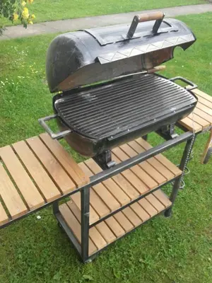 a grill sitting on top of a picnic table at Apartmani Radulović in Vrnjačka Banja