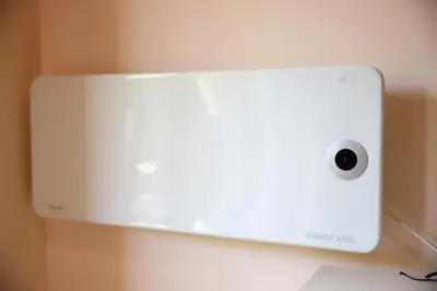 a white computer monitor sitting on top of a desk at Apartman Lena in Vrnjačka Banja