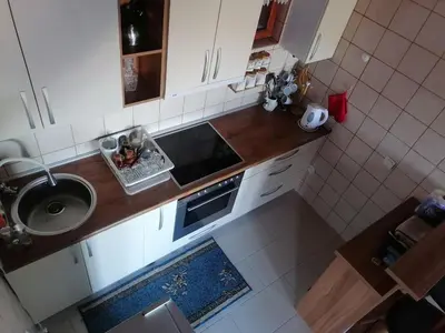 an overhead view of a kitchen with a sink at Apartments Holiday Home Srce in Kopaonik