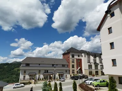 a rendering of the exterior of a building at K22 Apartment Milmari in Kopaonik