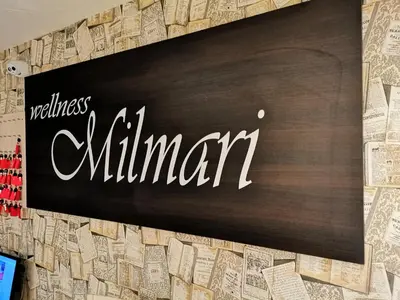 a chalkboard sign on a wall with the word winner at K22 Apartment Milmari in Kopaonik