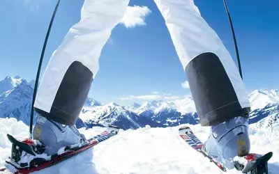 a person on skis standing on top of a mountain at SM Apartments Kopaonik III in Kopaonik