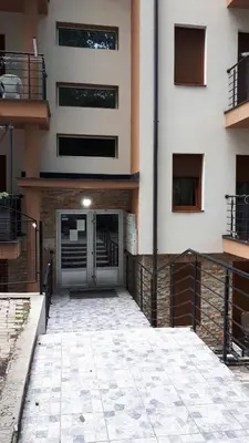 a building with a door on the side of it at Apartment Blagojevic in Vrnjačka Banja
