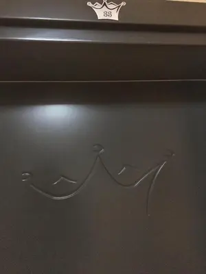 a close up of a drawer with two faces on it at Apartman 33 Kraljevi Čardaci in Kopaonik