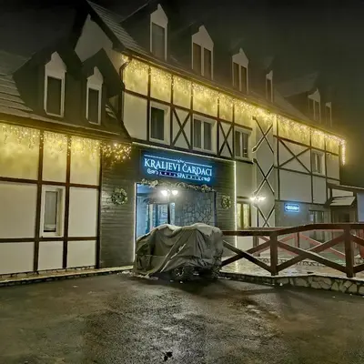 a building with a tent in front of it at night at Apartman 33 Kraljevi Čardaci in Kopaonik