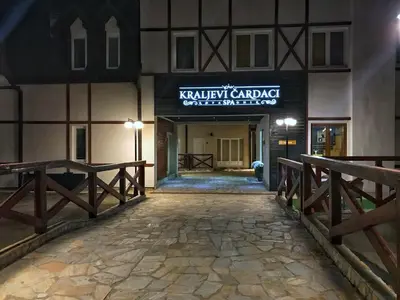 a building with a sign that reads ruby canadian confederation at Apartman 33 Kraljevi Čardaci in Kopaonik
