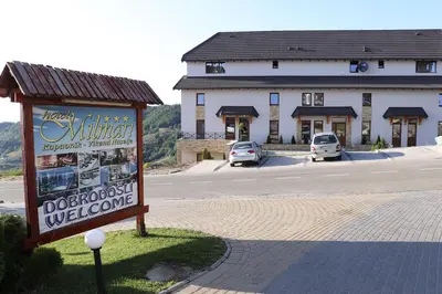 a sign in front of a building with a building at Astoria Lux - K16 Milmari in Kopaonik