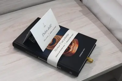 two books sitting on top of a table at Medical and Spa Centre Merkur in Vrnjačka Banja
