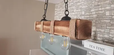 a wicker chandelier is hanging from a wall at Nice apartment in Niš