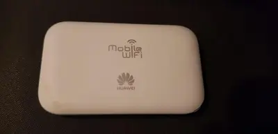 a white mouse with a molle nut logo on it at Nice apartment in Niš