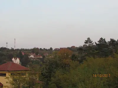 a view of a town with trees and houses at Debora Apartment in Vrnjačka Banja