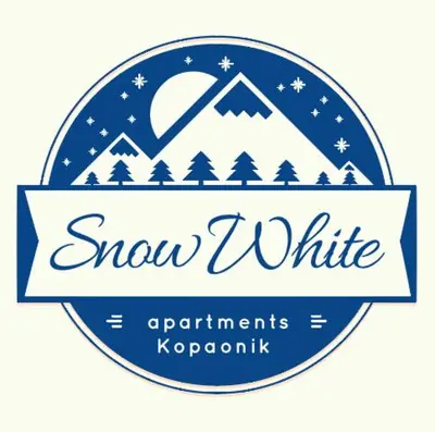 a label for snow white with mountains and a moon at Snow White apartments in Kopaonik